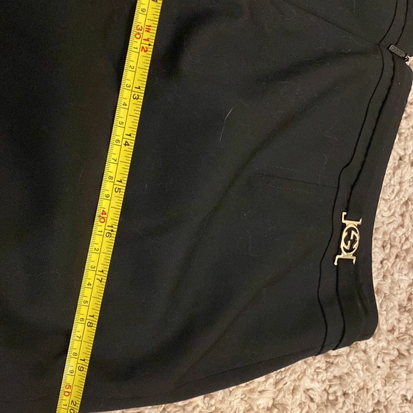 Black Gucci mini skirt with two silver GGs that rest on your back hips. With bag - Picture 9 of 10